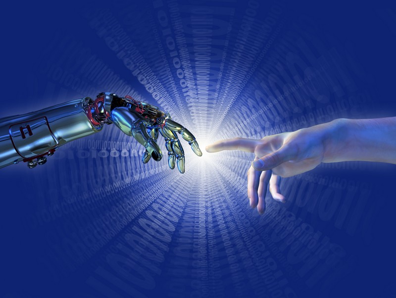 La technologie au service du handicap_robot-humain-mains_wp